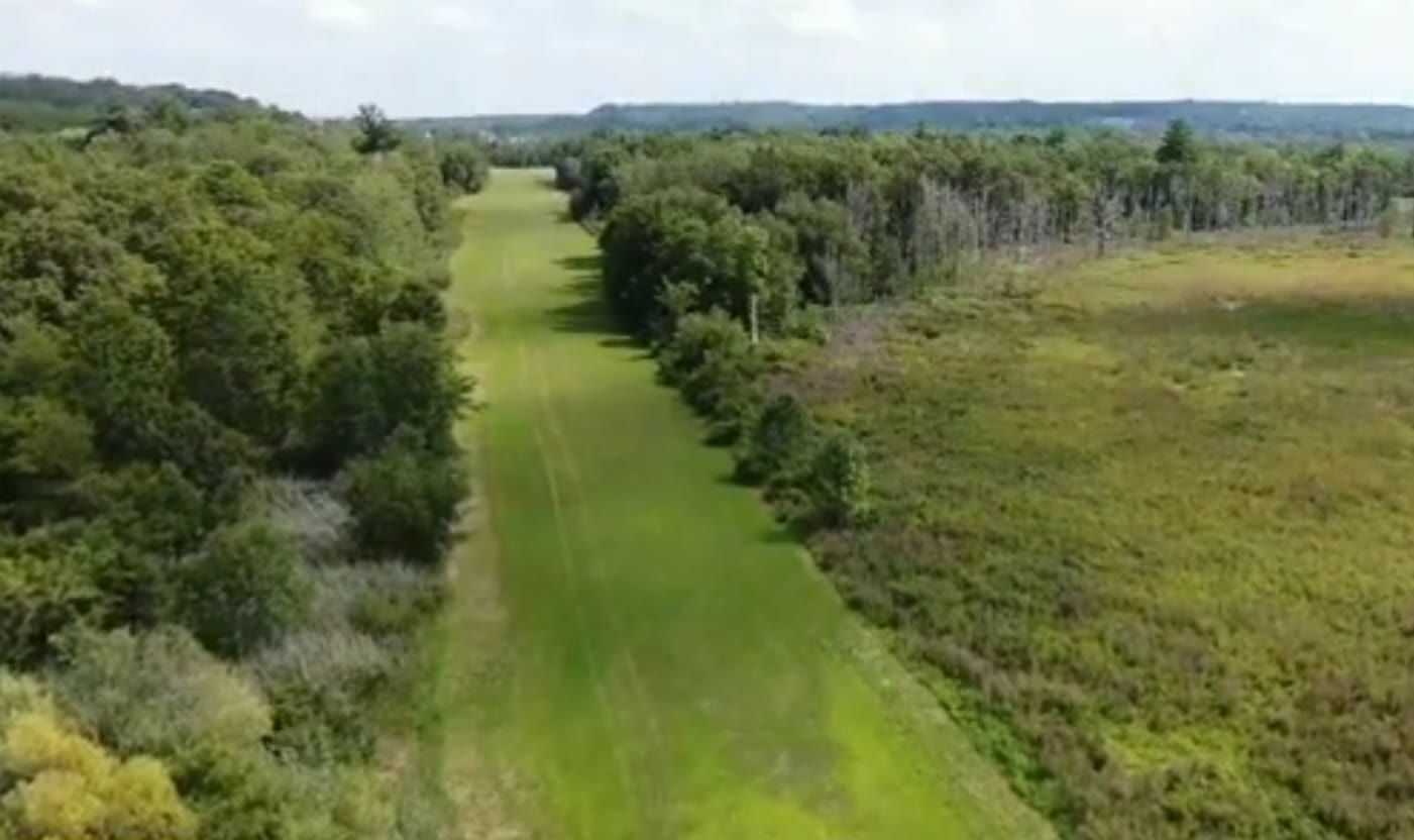 Aerial view along the Round Lake Airport grass runway